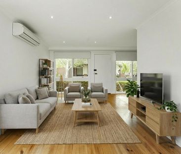 RENOVATED TWO BEDROOM UNIT WITH EXPANSE OF OUTDOOR SPACE - Photo 6