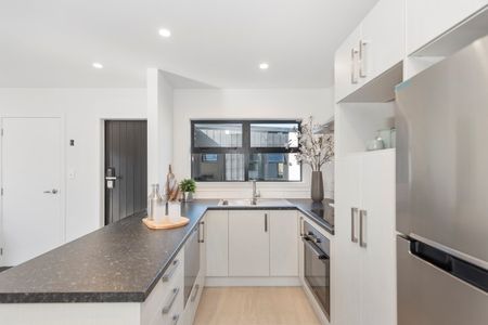 Located on Bruce Avenue, this modern two-bedroom unit offers comfortable, low-maintenance living in a fully secure setting with an automatic gate. - Photo 4