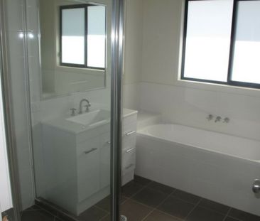 Family sized four bedroom home containing ducted air conditioning t... - Photo 6