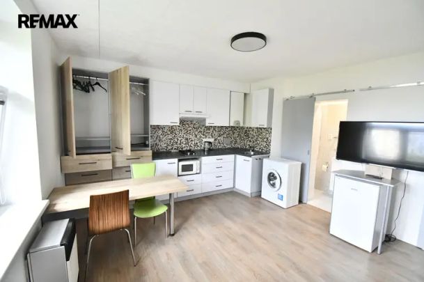 Pronájem pěkného bytu 1+kk o výměře 21 m - Fotografie 1
