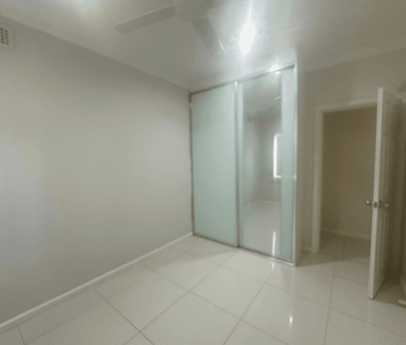 Spacious 4-Bedroom Family Home | Pool, Garage & Great Location - Photo 6