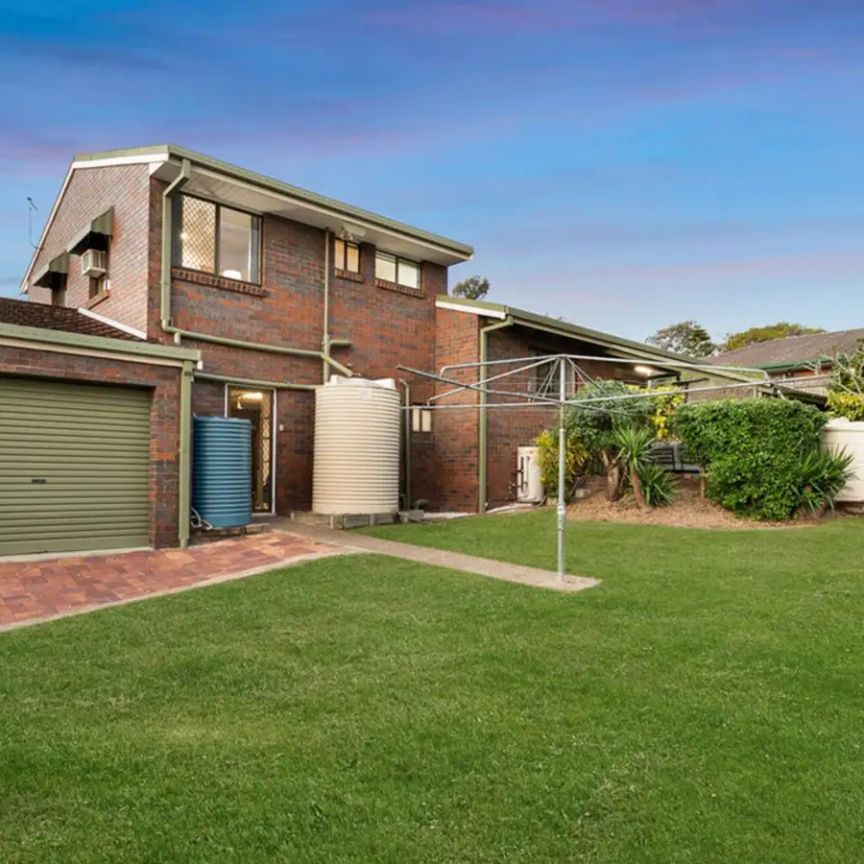 “Split Level 4 bedroom home with plenty of space for the family!” - Photo 1