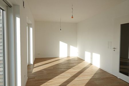 Moderne Dachgeschosswohnung mit großem Balkon in Wiesmoor! - Photo 5