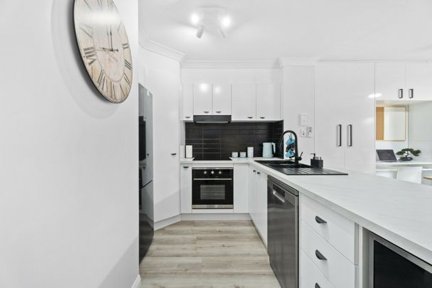 MODERN 2-BEDROOM UNIT - LOCATION. LIFESTYLE. LIVABILITY - Photo 1