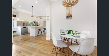 Family home located in the McKinnon School Zone! - Photo 2