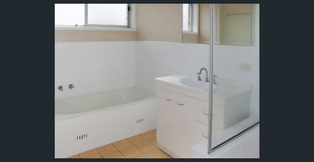 East Port Apartment - Security Building - Photo 1