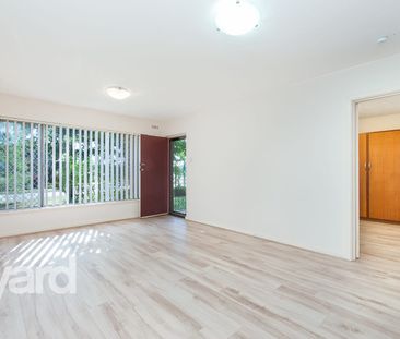 Conveniently Located Ground Floor Unit - Photo 1