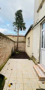 A LOUER APPARTEMENT EN RDC PROCHE CENTRE VILLE DE ST QUENTIN 02100 - Photo 4