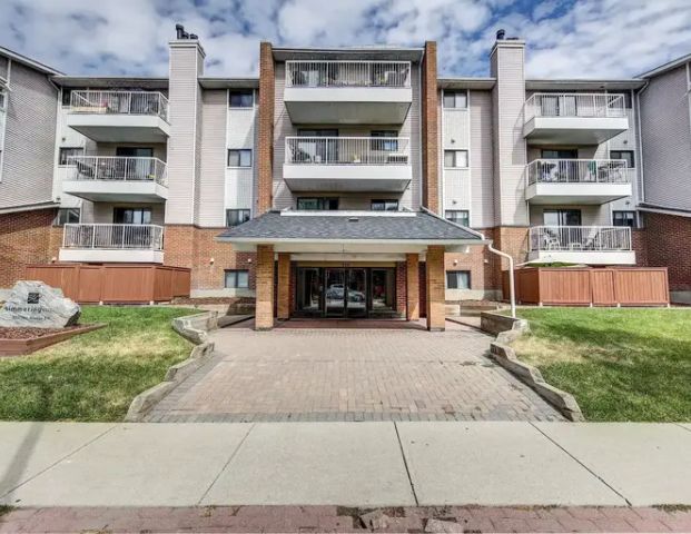 Massive Two Bedroom Furnished Condo is Lower Mount Royal | 305 - 930 18 Avenue Southwest, Calgary - Photo 1