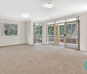 MODERN 2-BEDROOM GROUND FLOOR UNIT WITH SPACIOUS ENTERTAINER'S BALCONY - Photo 1