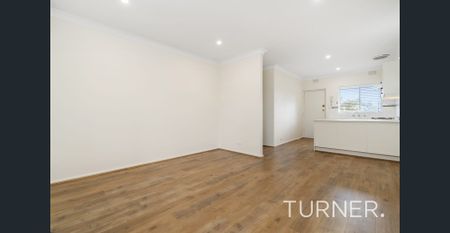 Recently renovated bright and light, well positioned 2 bedroom unit. - Photo 2
