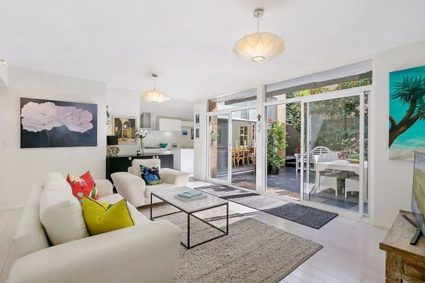 Light-Filled Three-Bedroom Townhouse in a Sought-After Location - Photo 1