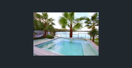 Exquisite 4-Bedroom Luxury Waterfront Living with Breathtaking Views - Photo 5