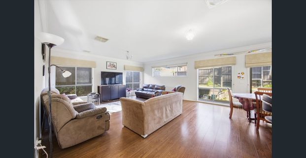Expansive Family Living with Two Main Bedrooms - Photo 1