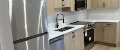 Biola's Basement Close to Downtown | 602 27 Avenue Northwest, Calgary - Photo 1