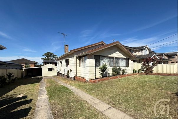 Updated 4 Bedroom Family Home, in a Prime Location! - Photo 1