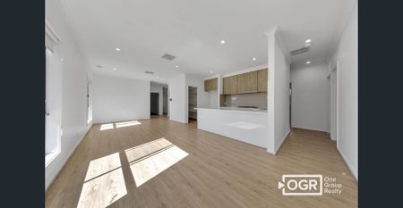 Discover Modern Elegance and Family Comfort in the Heart of Wollert! - Photo 2