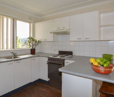 Convenient 2 Bedroom Apartment Close to Everything - Photo 4