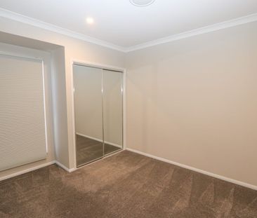 Gorgeous Family Home within Benowa State High School Catchment - Photo 4