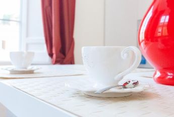 Center-Historic Jewish Quarter: Elegant apartment situated in beautiful Palazzo Nobiliare. Entrance, spacious living with original wood frescoed ceilings, large modern dining and kitchen, 4 bedrooms, 4 Baths, small terrace. #1527