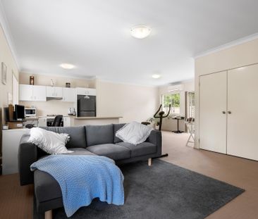 Nestled in a peaceful complex, this delightful two-bedroom unit off... - Photo 4