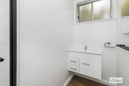 Renovated with plenty of modern conveniences - Photo 4