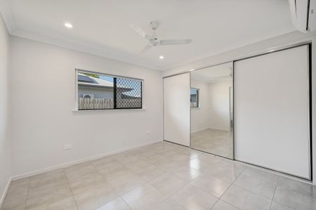 Modern Family Home with Pool in Prime Mount Low Location - Photo 5