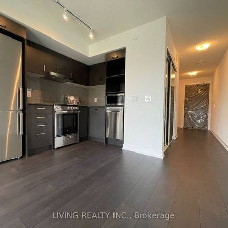 Feels brand new floor to ceiling windows! - Photo 4