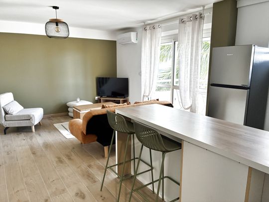 Location Appartement 2 pièces 58m² ST DENIS 97400 - Photo 1