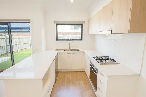 Spacious Family Home with Three Living Areas & 6.6kW Solar Panels! - Photo 1