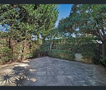 Charming 2-Bedroom Home with Courtyard & Character Features - Photo 4