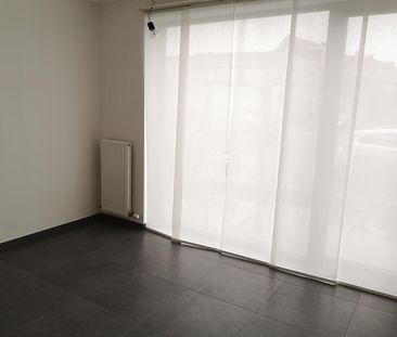 Gelijkvloers appartement met 1 slaapkamer, terras en parking - Photo 1