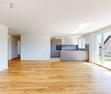 Sonnige Erdgeschosswohnung in moderner Überbauung ! - Photo 1