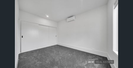 Modern 4-Bedroom Home in a Fantastic Location! - Photo 5