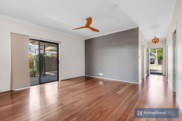 IMMACULATE AND WELL APPOINTED THREE BEDROOM HOME - Photo 1
