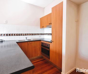 Good Size Townhouse in Great Taringa location - Photo 4