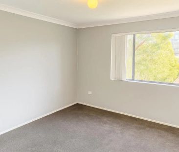 “Neat and Tidy 3 Bedroom Unit” - Photo 1