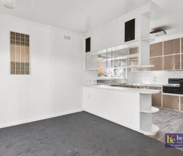Convenient Living in the Heart of Flora Hill - Photo 1