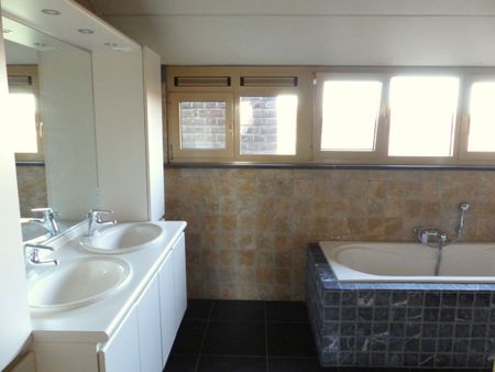Duplex-app. met 2 slpk., terras en garage in Herk-de-Stad. - Photo 5