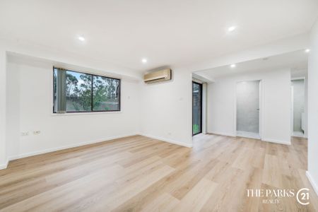 Newly Renovated Family Home in Sought after Bossley Park - Photo 5
