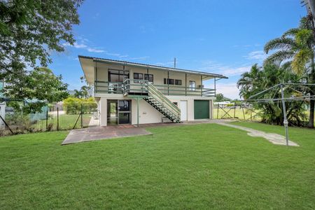 Spacious Family Home with Dual Decks & Prime Location - Photo 2