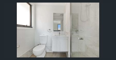 Spacious Modern 4-Bedroom Home in Premier Location | Steps to Park, Shops & Station - Photo 4