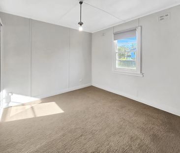 Charming Renovated Home in Prime Location - Photo 1