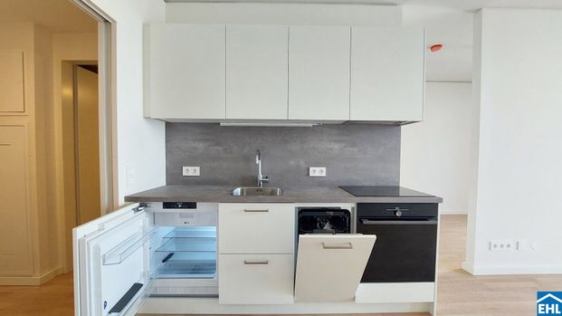 Moderne 1,5-Zi.-Wohnung mit Loggia & Rooftop Wellness - Foto 1