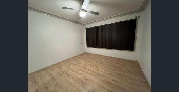 LARGE FAMILY HOME WITH TWO LIVING AREAS & ENTERTAINING BACK DECK! - Photo 1