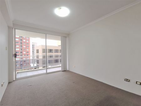 Unfurnished 2 bedroom plus car space for rent in the heart of CBD! - Photo 2