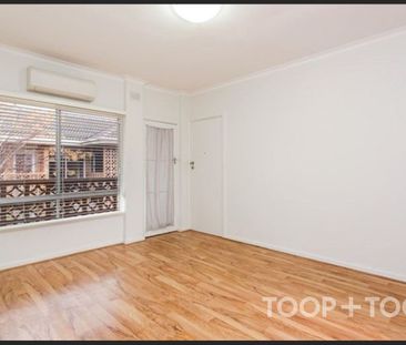 Renovated Unit in Premiere Location - Photo 1