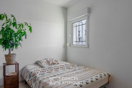 Bel appartement en duplex aux volumes généreux dans le bourg de Indre - Photo 4