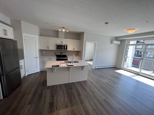 2 Bed Condo For Rent In Walden. Two Parking Stalls, A/C - Photo 1
