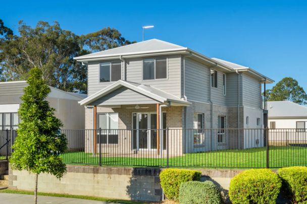 Stylish 2 Story Family Home in the Heart of Sanctum Estate - Photo 1
